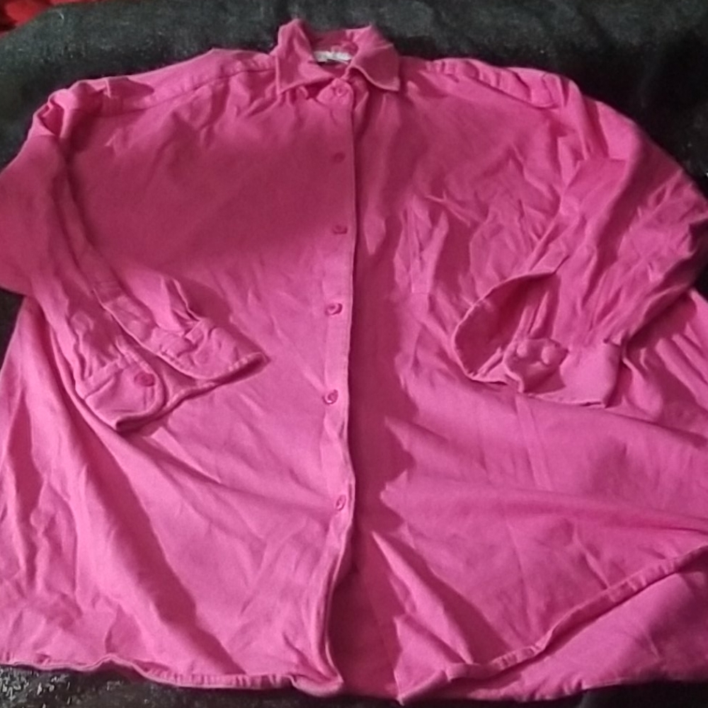 Pink long sleeved buttoned down shirt